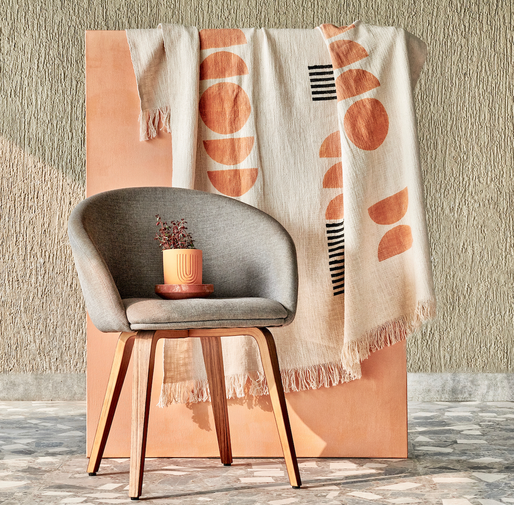 Featuring a color block design and finished with fringes, this throw blanket makes any room look welcoming while adding a subtle pop of style. Throw this color block fringe blanket over a bed, sofa, or armchair. It's perfect for summer or fall decor. Ethically made in India from 100% cotton and hand-block printed by master artisans.