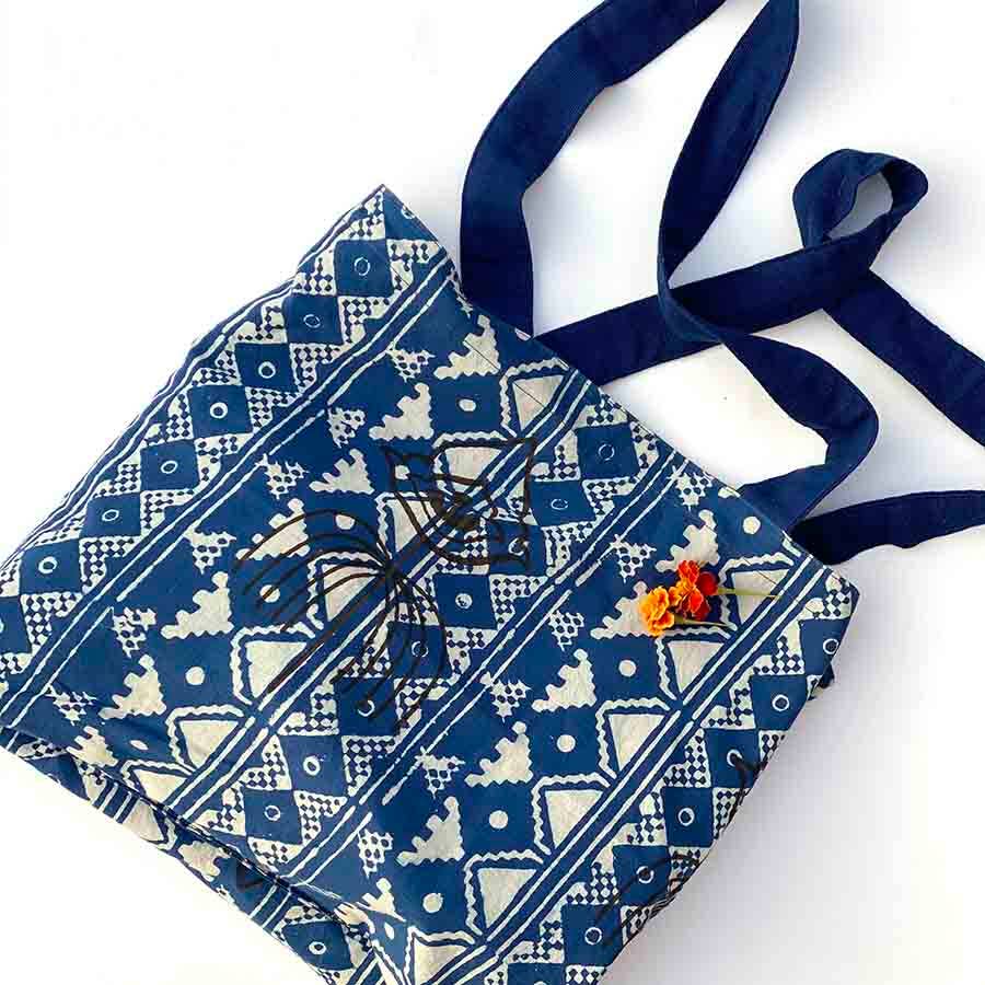 Avatar - Reversible Bag in blue, white, and coral / red. By Ichcha, block printed in India